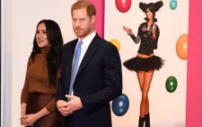 Britain's Prince Harry, Duke of Sussex and Meghan, Duchess of Sussex react as they view a special exhibition of art by Indigenous Canadian artist, Skawennati, in the Canada Gallery during their visit to Canada House, in London on 7 January 2020, to give thanks for the warm Canadian hospitality and support they received during their recent stay in Canada. Picture: AFP
