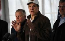 FILE: New York Governor Andrew Cuomo speaks to the media and tours a newly opened drive through COVID-19 mobile testing center on 13 March 2020 in New Rochelle, New York. Picture: AFP