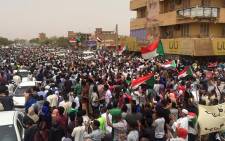 FILE: Sudanese protestors chant slogans demanding civilian rule on 30 June 2019 during a rally in Khartoum's southern al-Sahafa district. Police fired tear gas at protesters in Khartoum as thousands gathered for a mass demonstration against Sudan's ruling generals, amid international calls for restraint to avoid a new deadly crackdown. Picture: AFP.
