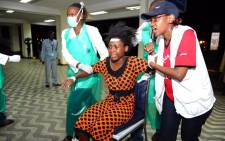 FILE: Paramedics attend to an injured Kenyan student as she is wheeled into Kenyatta National Hospital in Nairobi on 2 April, 2015, following an attack at Garissa University College. Picture: AFP.