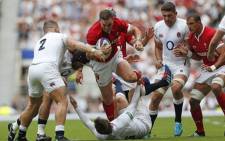 Wales' wing George North (C) gets tackled during the international Test rugby union match between England and Wales at Twickenham Stadium in west London on 11 August 2019. Picture: AFP