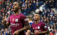 Manchester City's English midfielder Raheem Sterling (R) celebrates scoring the team's third goal with Manchester City's English defender Kyle Walker during the English Premier League football match between West Bromwich Albion and Manchester City at The Hawthorns stadium in West Bromwich, central England, on 28 October 2017. Picture: AFP.
