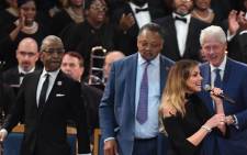 Faith Hill performs, as Rev. Al Sharpton (L), Rev. Jesse Jackson (C) and former US President Bill Clinton listen, during Aretha Franklin's funeral at Greater Grace Temple on 31 August 2018 in Detroit, Michigan. Picture: AFP.
