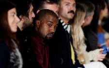 US rapper Kanye West (C) attends the presentation of the Fall 2015 collection by US designer Jeremy Scott. EPA/JASON SZENES