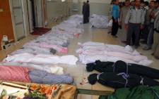 More than 92 people, 32 of them children, were killed on 26 May, 2012 in Homs by Assad's forces. Picture: AFP