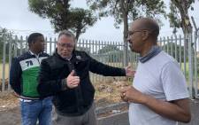 The Western Cape ANC's Cameron Dugmore (centre), along with other party members, on 2 February 2022 visited a site in Claremont set to be auctioned off by the City of Cape Town. Picture: Kaylynn Palm/Eyewitness News