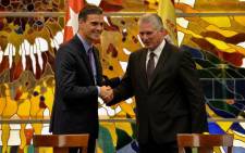 Cuba's President Miguel Diaz-Canel (R) and Spain's Prime Minister Pedro Sanchez shake hands after signing bilateral agreements during a ceremony at Revolution Palace in Havana, on 22 November 2018. Sanchez' two-day official visit to Cuba is the first in over 30 years by a Spanish PM to the island nation. Picture: AFP