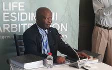 State witness Levy Mosenogi, the Gauteng Health Department Chief Director of planning, policy and research, testifies during the Life Esidimeni arbitration process. Picture: Masego Rahlaga/EWN