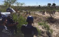 FILE: Law enforcement on Wednesday completely destroyed all the structures built by Khayelitsha residents who illegally invaded a piece of land in the township. Picture: Thomas Holder/EWN.