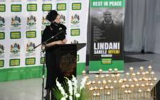 Mrs Lindsay Myeni, the wife of Lindani Myeni, paying tribute to her late husband at his funeral in eSikhaleni on 8 May 2021. Picture: @kzngov/Twitter