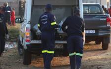 Forensic Pathology Services load little Khomanani Mawa's body into their vehicle after it was retrieved from the Evaton sewerage system on 8 September 2021. Mawa fell into a manhole near his Orange Farm home on 5 September 2021. Picture: Edwin Ntshidi/Eyewitness News