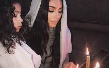 Kim Kardashian West and her daughter North pictured during their baptism at the Etchmiadzin Cathedral in Armenia. Picture: @kimkardashian/Twitter
