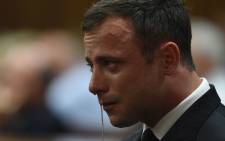 FILE: An emotional Oscar Pistorius in the dock as judgment is handed down in his murder trial at the High Court in Pretoria on Thursday, 11 September 2014. Picture: Pool.