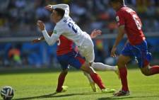FILE: England’s midfielder Ross Barkley (2nd R) clashes with Costa Rica's defender Giancarlo Gonzalez (L). Picture: AFP.