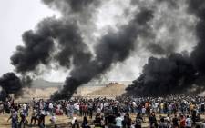 A picture taken on 4 May 2018 from the border with Israel in the northern Gaza strip east of Gaza City shows a general view of a clashes between Palestinians and Israeli forces. Picture: AFP