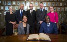 Members of the Norwegian Nobel Peace Prize comitee (Up L-R) Anne Enger, Thorbjorn Jagland, Henrik Syse, Asle Toje and Berit Reiss-Andersen pose beside Nobel Peace Prize laureates (Bottom L-R) Congolese doctor Denis Mukwege and Yazidi activist Nadia Murad at a press conference on 9 December 2018 in Oslo on the eve of the Peace Prize ceremony. Picture: AFP.