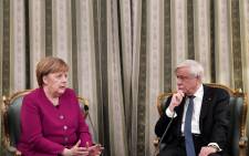 German Chancellor Angela Merkel (L) chats with Greek President Prokopis Pavlopoulos during their meeting in Athens on 11 January 2019. Picture: AFP