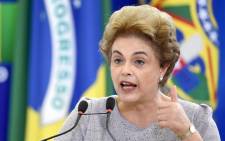 FILE: Former Brazilian President Dilma Rousseff delivers a speech during meeting with a group of jurists and lawyers who came to the Planalto Palace in Brasilia to provide support in 22 March, 2016. Picture: AFP