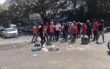 A small group of protesting students blocked roads with stones and rubble in Braamfontein near Wits University as part of the National Shutdown over student finances on 15 March 2021. Picture: Mia Lindeque/Eyewitness News