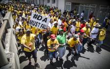 ANC members dance and sing down Mill Street in Cape Town after holding an anti-racism march outside of the DA headquarters: Thomas Holder/EWN