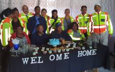 The Delft CPF host a party for Denzil Daniels (in blue) and his mother Jane Daniels (front left) after they returned from eSwatini on 30 June 2019 where the duo were reunited after Denzil disappeared from his Delft home in 2013. Picture: Supplied