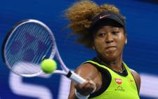 Japan's Naomi Osaka hits a return to Czech Republic's Marie Bouzkova during their 2021 US Open Tennis tournament women's singles first round match at the USTA Billie Jean King National Tennis Center in New York, on 30 August 2021. Picture: Ed Jones/AFP