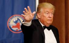 FILE. Republican presidential candidate Donald Trump waves to the guests after speaking during the 2016 annual New York State Republican Gala on 14 April, 2016 in New York City. Picture: AFP.