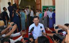 FILE: Myanmars Commander-in-Chief Min Aung Hlaing talking to journalists after casting his ballot at a polling center in Naypyidaw on 8 November 2015. Picture: AFP.
