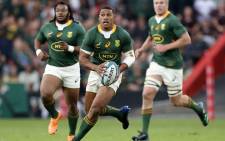 South Africa's fullback Damian Willemse (C) runs with the ball during the Rugby Championship international rugby match between South Africa and New Zealand at Emirates Airline Park in Johannesburg on 13 August 2022. Picture: PHILL MAGAKOE / AFP