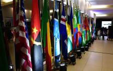 The United States of America's flag alongside various African flags at the African Growth and Opportunity Act (AGOA) Forum in Nasrec. Picture: X/@GovernmentZA