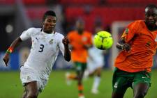 Zambian defender Hichani Himoonde (R) vies with Ghana’s Asamoah Gyan during the Afcon semi-final football match between Ghana and Zambia in Bata on Feburary 8, 2012. Picture: AFP