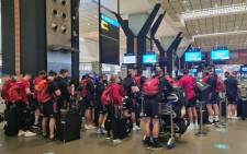 Munster players and staff at an airport in South Africa as they prepare to depart the country following the detection of the Omicron coronavirus variant. Picture: @Munsterrugby/Twitter