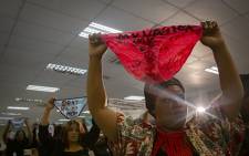 FILE: Women activists hold up underwear at the gender-based violence summit during President Cyril Ramaphosa's speech. Picture: Sethembiso Zulu/EWN