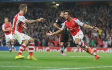 Arsenal's Alexis Sanchez celebrates after scoring a goal against Besiktas in the Champions League play-offs on 28 August 2014. Picture: Official Arsenal FC Facebook page