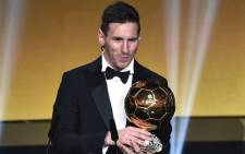 FC Barcelona and Argentina's forward Lionel Messi holds his trophy after receiving the 2015 FIFA Ballon d’Or award for player of the year during the 2015 AFIFA Ballon d'Or award ceremony at the Kongresshaus in Zurich on January 11, 2016. Picture: FP