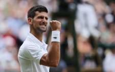 Serbia's Novak Djokovic celebrates breaking the serve of Italy's Jannik Sinner during their men's singles quarterfinal tennis match on the ninth day of the 2022 Wimbledon Championships at The All England Tennis Club in Wimbledon, southwest London, on 5 July 2022. Picture: Adrian DENNIS/AFP