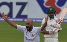 Pakistan's Sajid Khan (L) appeals unsuccessfully for the dismissal of Bangladesh's Najmul Hossain Shanto during the fourth day of the second Test cricket match between Bangladesh and Pakistan at the Sher-e-Bangla National Cricket Stadium in Dhaka on December 7, 2021.  Picture: Munir Uz zaman / AFP.