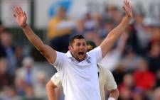 England's Tim Bresnan celebrates after claiming the wicket during the fourth day of the fourth Ashes cricket test match between England and Australia at the Durham cricket ground in Durham, north-east England, on August 12, 2013. Picture: AFP 