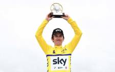 Team Sky rider Geraint Thomas with a trophy after winning the Criterium du Dauphine. Picture: @dauphine/Twitter.