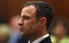 FILE: Oscar Pistorius listens to judgment being handed down in his murder trial at the High Court in Pretoria on 11 September 2014. Picture: Pool.