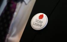 Campaign memorabilia is pictured on the jacket of a man as he attends the world premiere of the film ‘Brexit: the Movie’ in London’s Leicester Square, ahead of the EU referendum in Britain on 23 June, 2016. Picture: AFP.