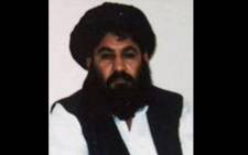 This handout file photo released by the Afghan Taliban on 3 December 2015, which was taken on a mobile phone in mid-2014 is said to show Afghan Taliban leader Mullah Akhtar Mansour posing for a photograph at an undisclosed location in Afghanistan. Picture: Handout/Afghan Taliban/AFP