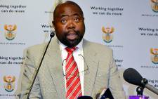Public Works Minister Thulas Nxesi reveals the results of the Nkandla investigation by his department on 27 January 2013 in Pretoria. Picture: Theo Nkonki/EWN