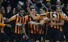 Players of Hull City FC celebrate after scoring a goal during a Premier League match. Picture: Hull Tigers