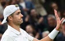 US John Isner reacts to beating Britain's Andy Murray during their men's singles tennis match on the third day of the 2022 Wimbledon Championships at The All England Tennis Club in Wimbledon, southwest London, on June 29, 2022. Picture:  Bozon / AFP