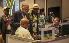ANC Western Cape elections head Ebrahim Rasool and other members of the party monitor results at the IEC results centre in Cape Town. Picture: Cindy Archillies/EWN