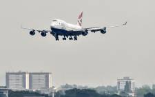 In this file photograph taken on 3 May 2019, a British Airways Boeing 747 passenger aircraft prepares to land at London Heathrow Airport, west of London. Pictur: AFP