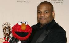 Puppeteer Kevin Clash and his Sesame Street character Elmo at the 35th Annual International Emmy Awards in New York. Picture: AFP.
