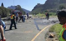 FILE: this file photo shows law enforcement, traffic, fire and rescue personnel cleaning up following a protest in Kleinmond. Picture: @OverstrandMuni/Twitter