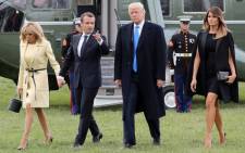 French first lady Brigitte Macron and French President Emmanuel Macron walk with US President Donald Trump and US first lady Melania Trump upon arrival at Mount Vernon, the estate of the first US President George Washington, in Mount Vernon, Virginia, 23 April, 2018. Picture: AFP.